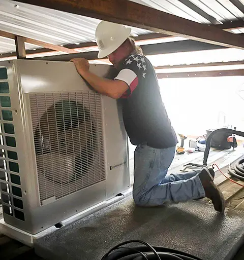 Air Right Heating & Air tech installing a ductless mini split unit for a customer's home